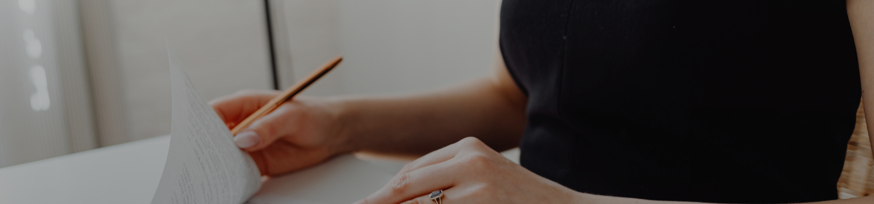 Business owner reviewing contract documents at desk Australia | Foundd Legal