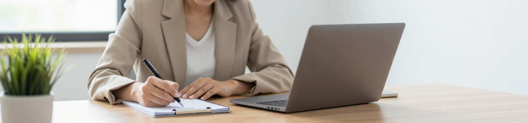 An Australian coach reviewing a coaching contract template before signing a new client. 