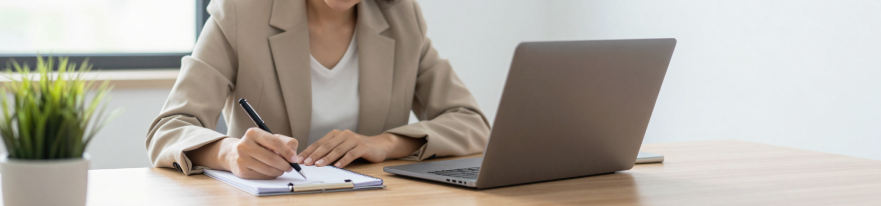 An Australian coach reviewing a coaching contract template before signing a new client. 