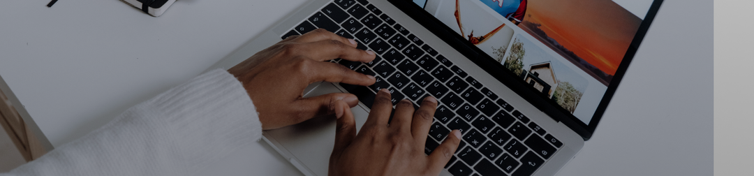 Does your website have a privacy policy? Person sitting at laptop typing
