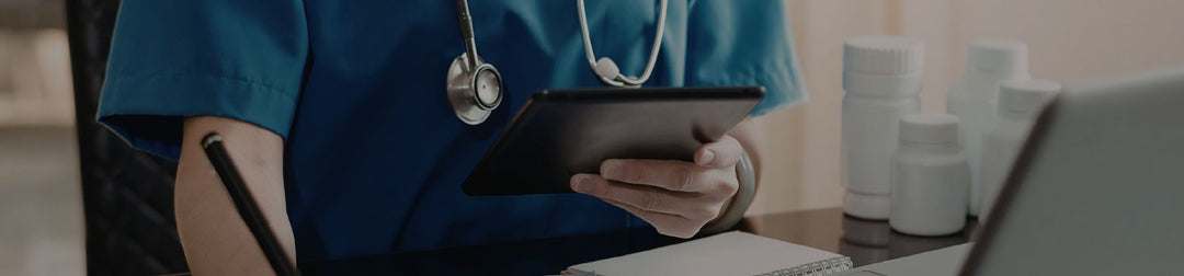 Injectables clinic owner reviewing a compliant marketing checklist for AHPRA and TGA advertising on a tablet. | Foundd Legal