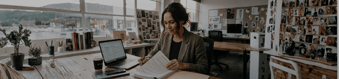 Australian creative business owner reviewing legal documents before EOFY 
