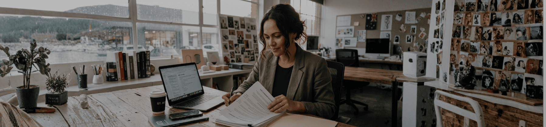 Australian creative business owner reviewing legal documents before EOFY 