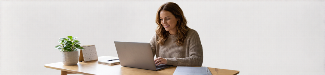 Virtual assistant working on a laptop at a home office desk, Australian small business     Foundd Legal 